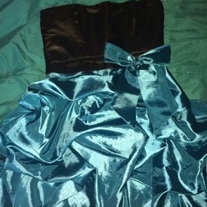 Hi guys this is a very cute blue and black dress.